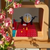 The lottery number board game includes a ball-shaking device and panels numbered 1 to 90 for casual interactive family gatherings and fun toys for multiple people Application Scenario